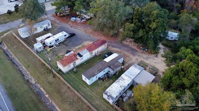 1.3 acre parcel with over 200 feet of road frontage on 9-Mile Rd - photo 8