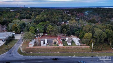 1.3 acre parcel with over 200 feet of road frontage on 9-Mile Rd - photo 10