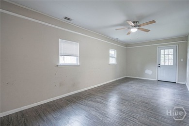 Semi-Updated interior layout creates large open area floor plan - photo 4