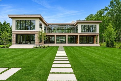 A newly built modern showpiece with sweeping bay and pond views - photo 1