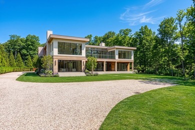 A newly built modern showpiece with sweeping bay and pond views - photo 2