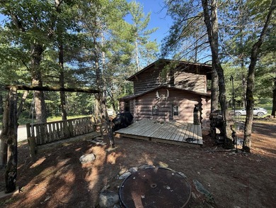 Escape to Your Ultimate Up North Retreat! Tucked away deep in - photo 2