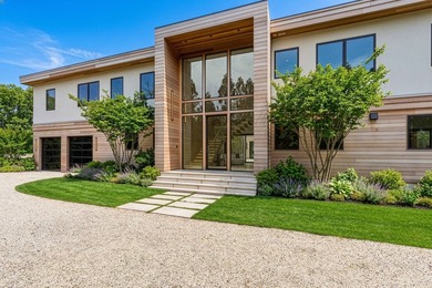 A newly built modern showpiece with sweeping bay and pond views - photo 3
