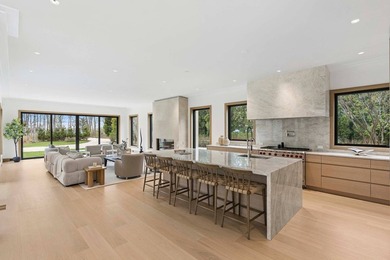 A newly built modern showpiece with sweeping bay and pond views - photo 4