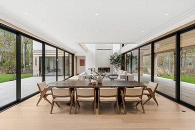 A newly built modern showpiece with sweeping bay and pond views - photo 5