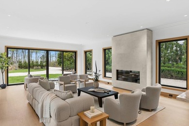 A newly built modern showpiece with sweeping bay and pond views - photo 6