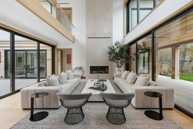 A newly built modern showpiece with sweeping bay and pond views - photo 9