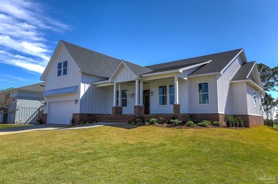 New Construction in a fantastic location in the Tiger Point Golf - photo 1