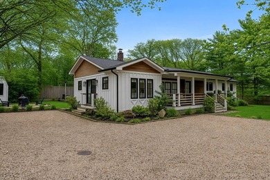 Tucked away on a large, private flag lot, this fully renovated 2 - photo 3
