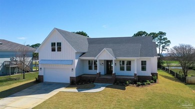 New Construction in a fantastic location in the Tiger Point Golf - photo 5