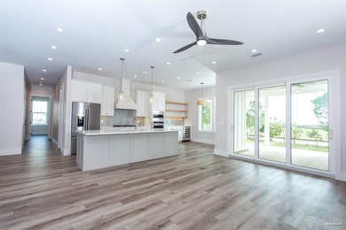 New Construction in a fantastic location in the Tiger Point Golf - photo 9