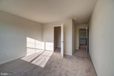 The Legend features a 1st-floor owner suite with a grand - photo 4