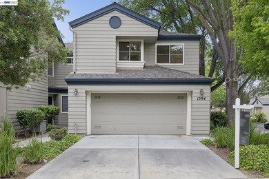 This is it! Rare end-unit townhome that lives like a - photo 3