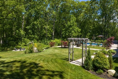 Perched on an elevated 1+ acre lot in the coveted Shore Acres - photo 13