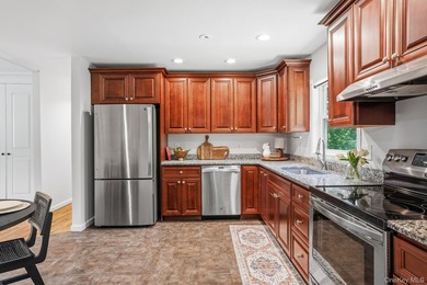 Tucked away in a private, park-like setting, this stunning - photo 14