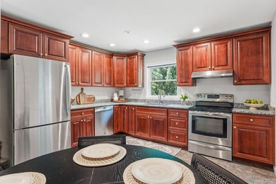 Tucked away in a private, park-like setting, this stunning - photo 15
