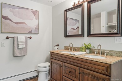 Tucked away in a private, park-like setting, this stunning - photo 17