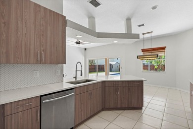 Florida living shines in this beautifully maintained pool home - photo 17