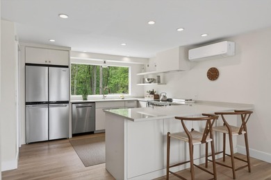 Perched on an elevated 1+ acre lot in the coveted Shore Acres - photo 26
