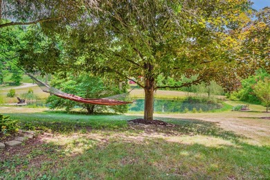 Tucked away in a private, park-like setting, this stunning - photo 29