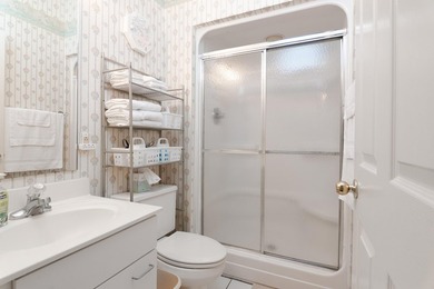 This three-bedroom, three-bath residence is priced to sell and - photo 30