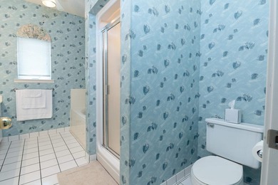 This three-bedroom, three-bath residence is priced to sell and - photo 34