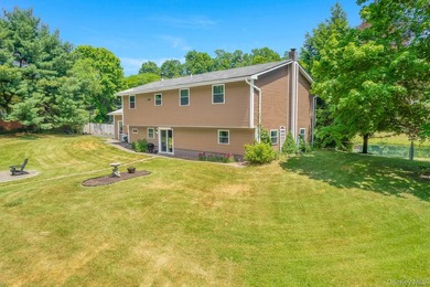 Tucked away in a private, park-like setting, this stunning - photo 35