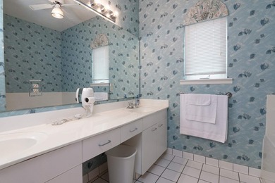 This three-bedroom, three-bath residence is priced to sell and - photo 36