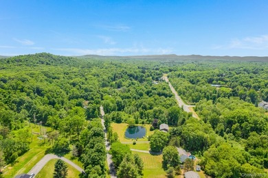Tucked away in a private, park-like setting, this stunning - photo 36