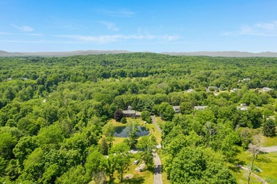 Tucked away in a private, park-like setting, this stunning - photo 38