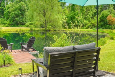 Tucked away in a private, park-like setting, this stunning - photo 39