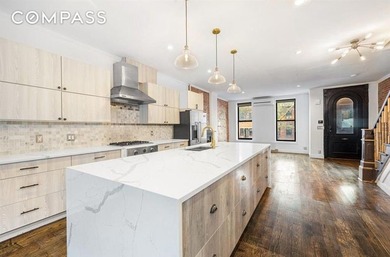 Welcome to 308 Clifton Place, a renovated townhouse nestled in - photo 1