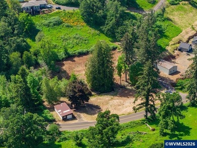 Bring your ideas to this 1.6 acre private lot on the outskirts - photo 1