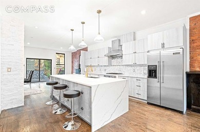 Welcome to 308 Clifton Place, a renovated townhouse nestled in - photo 2