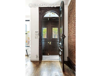 Welcome to 308 Clifton Place, a renovated townhouse nestled in - photo 10