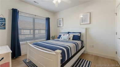 Experience the ultimate lake lifestyle in this impeccably