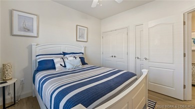 Experience the ultimate lake lifestyle in this impeccably