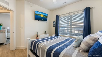 Experience the ultimate lake lifestyle in this impeccably