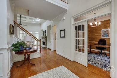 Set on a generous .68-acre lot with access to 15 acres of green - photo 11