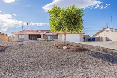 This home offers 3 bedrooms, 2 bathrooms, and a versatile - photo 1
