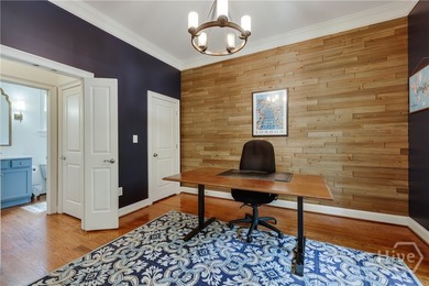 Set on a generous .68-acre lot with access to 15 acres of green - photo 12