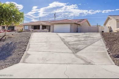 This home offers 3 bedrooms, 2 bathrooms, and a versatile - photo 2