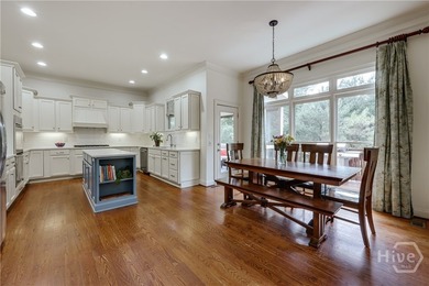 Set on a generous .68-acre lot with access to 15 acres of green - photo 18