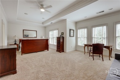 Set on a generous .68-acre lot with access to 15 acres of green - photo 25