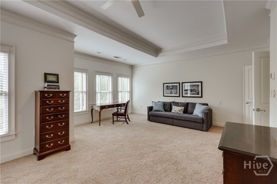 Set on a generous .68-acre lot with access to 15 acres of green - photo 26