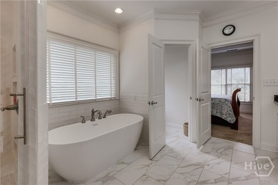 Set on a generous .68-acre lot with access to 15 acres of green - photo 31