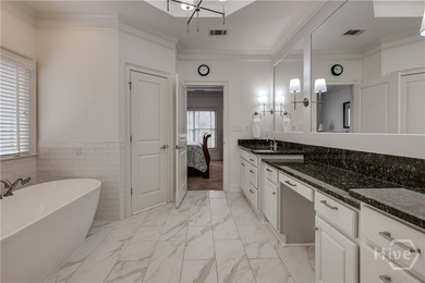 Set on a generous .68-acre lot with access to 15 acres of green - photo 32
