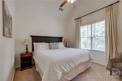 Set on a generous .68-acre lot with access to 15 acres of green - photo 34
