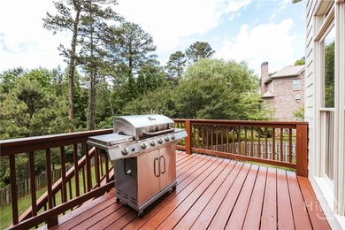 Set on a generous .68-acre lot with access to 15 acres of green - photo 46