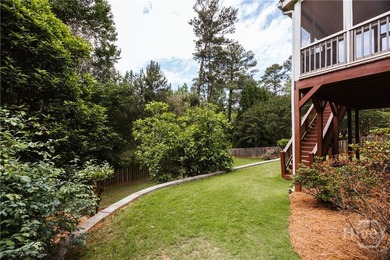 Set on a generous .68-acre lot with access to 15 acres of green - photo 50
